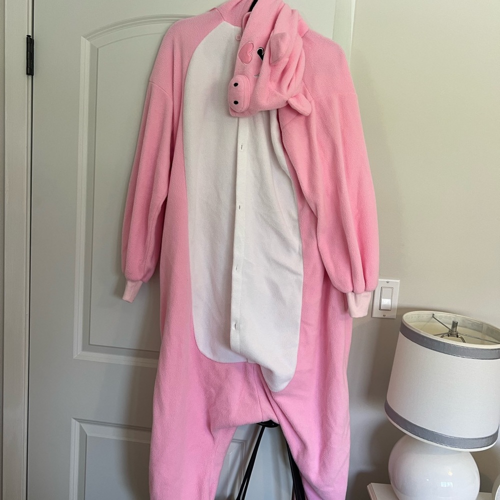 Pink pig costume onesie